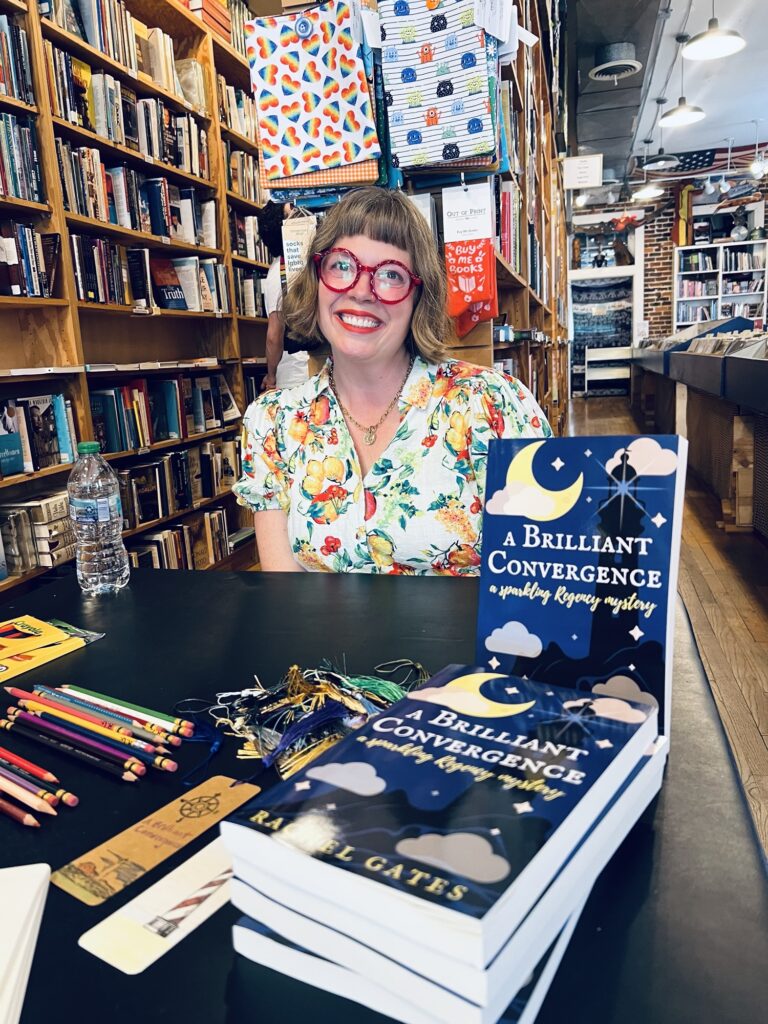 author signs books at a local bookstore